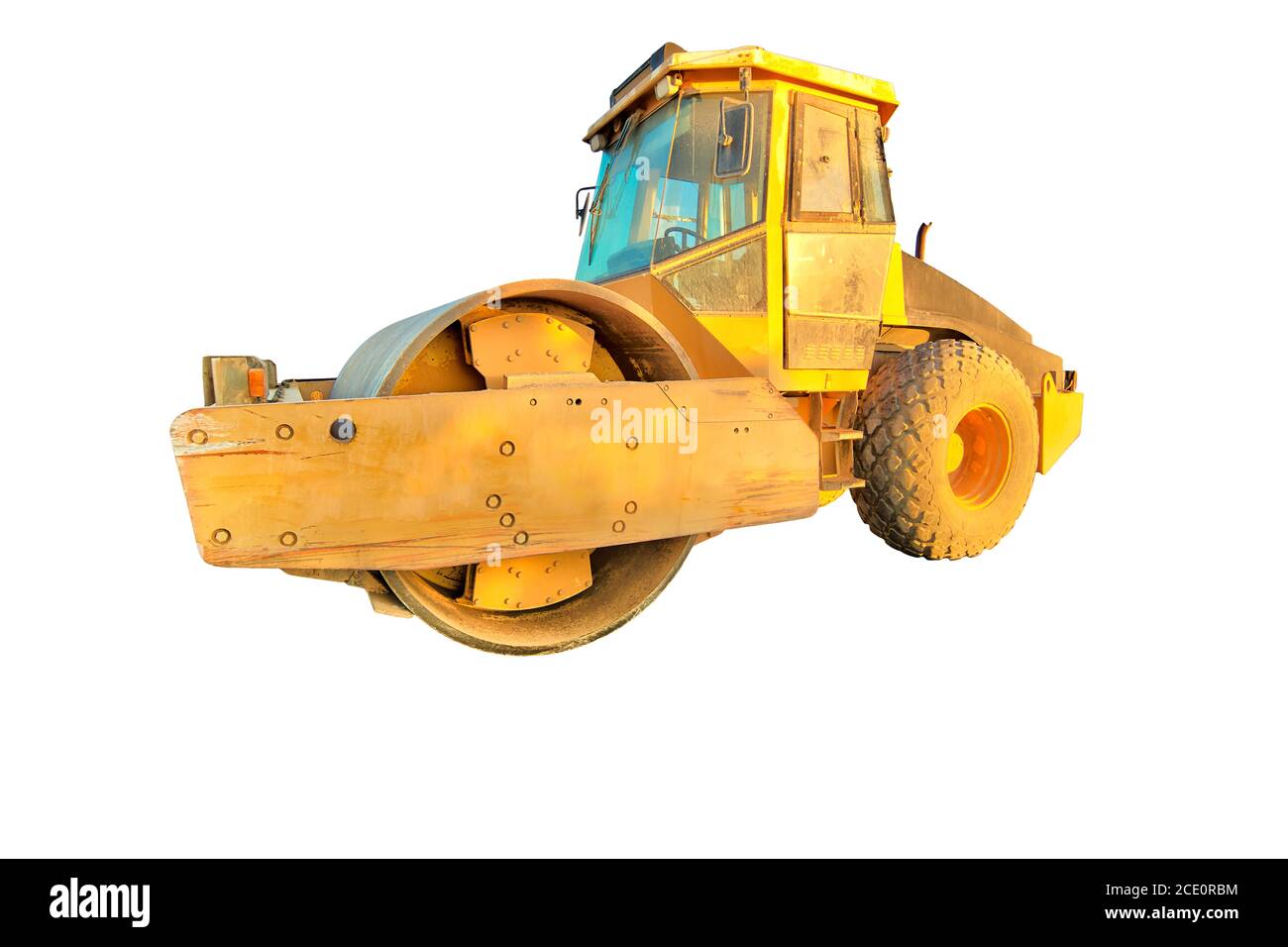 Side view of steamroller isolated on white background with copy space. Concept of work in progress. Stock Photo