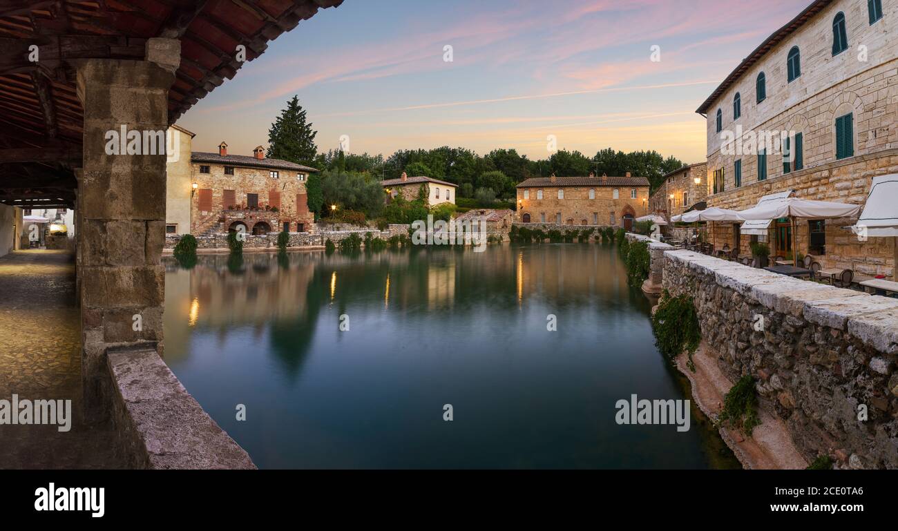 Thermal bath town of Bagno Vignoni, Italy during sunrise Stock Photo