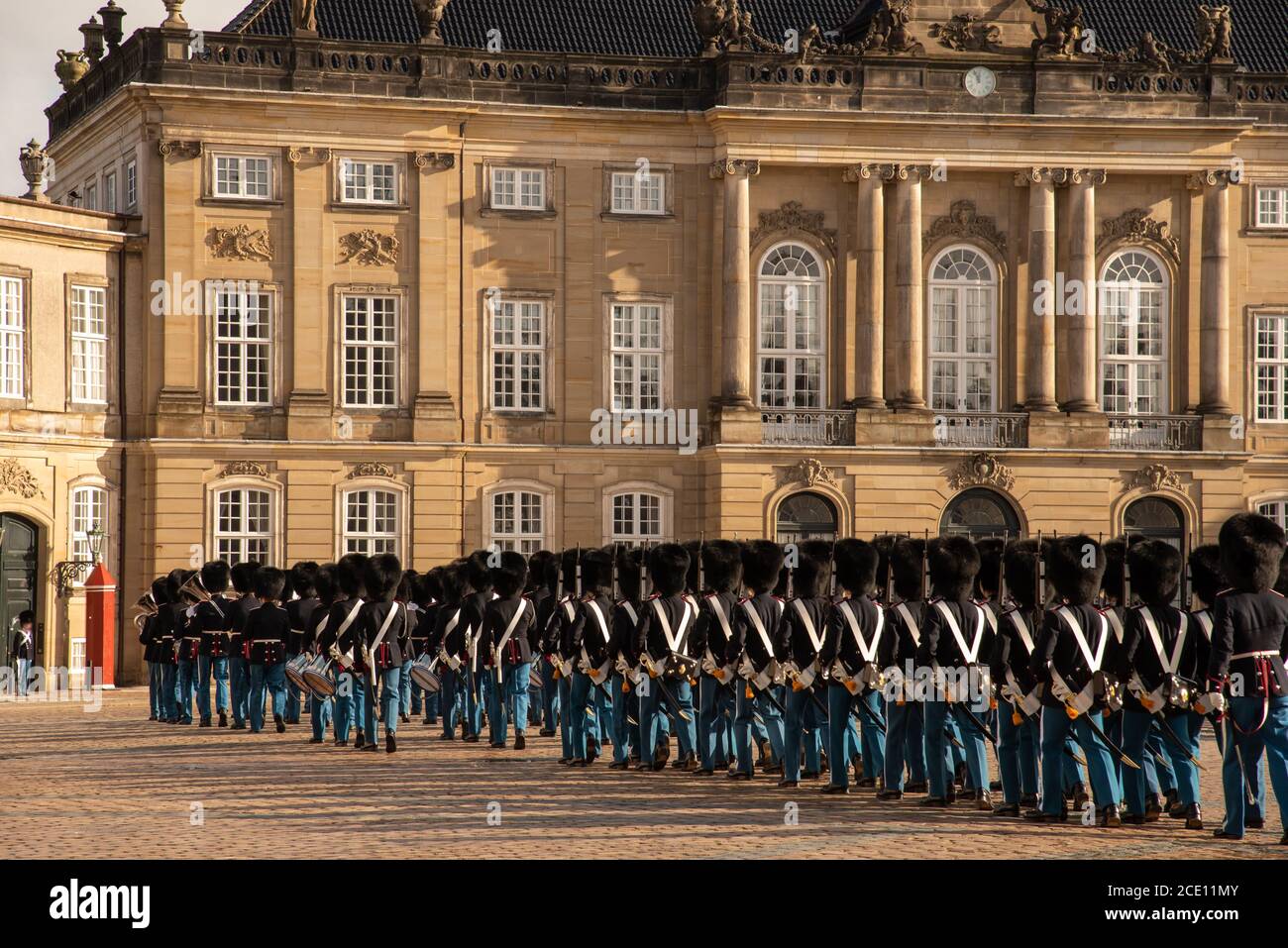 Copenhagen Royal Life Guards marching to Amalienborg Palace Stock Photo