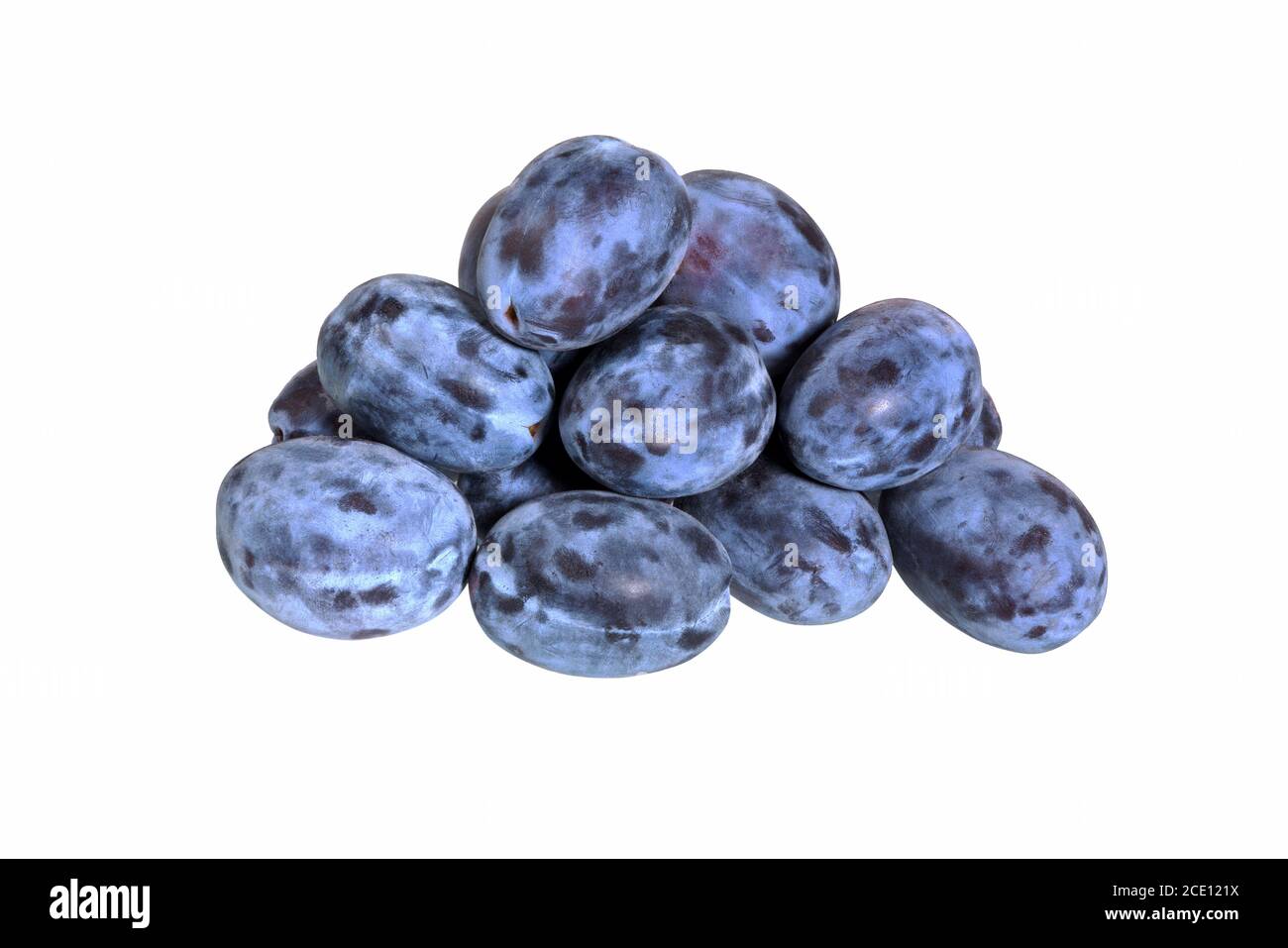 Plums isolated on White Background. Juicy prunes plum heap close up. Stock Photo