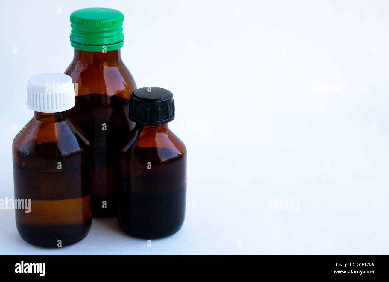 Dark glass bottles with antiseptics, herbal tinctures and other liquid ...