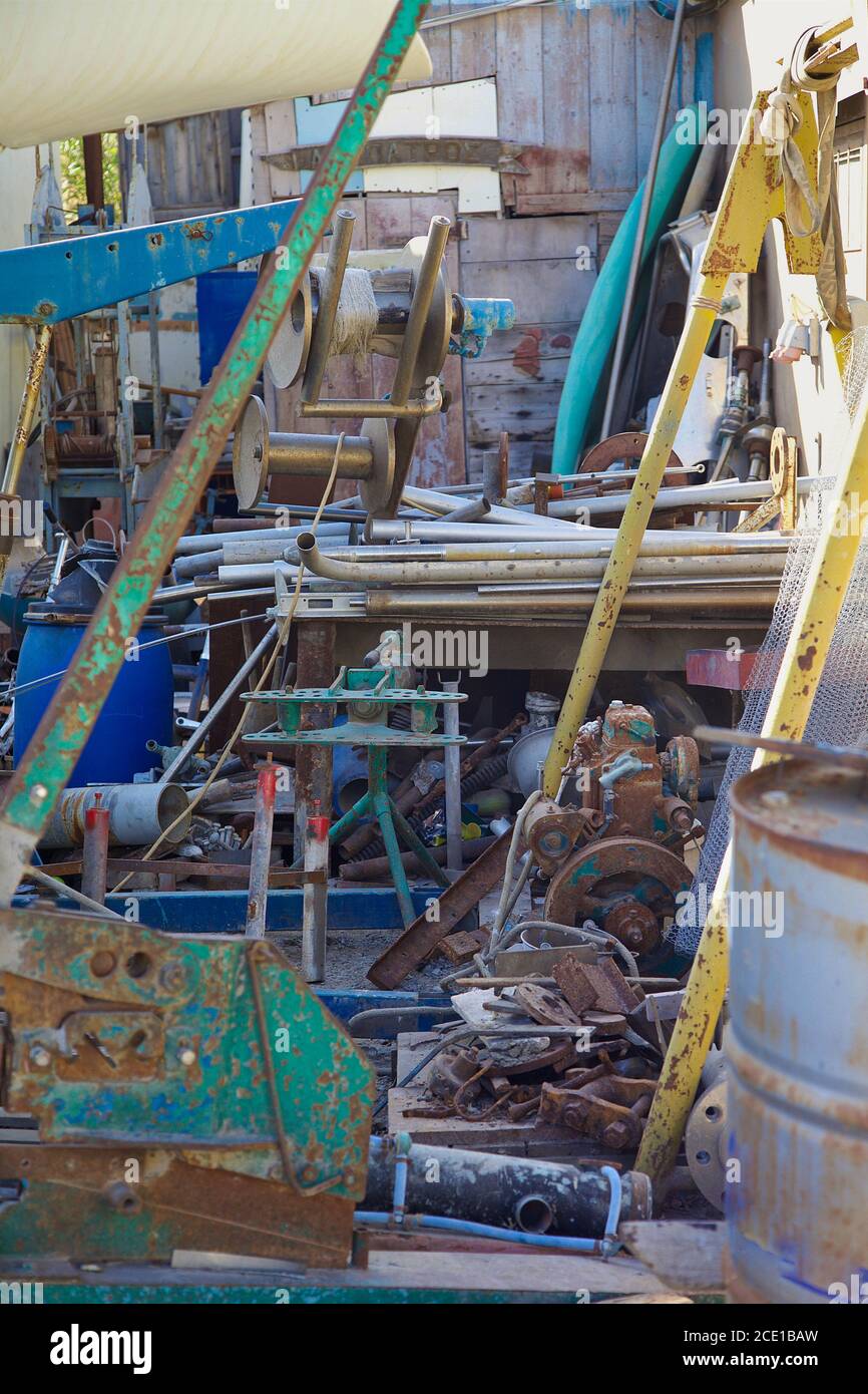 Industrial old corroding Industrial equipment dumped in junkyard. Stock Image. Stock Photo