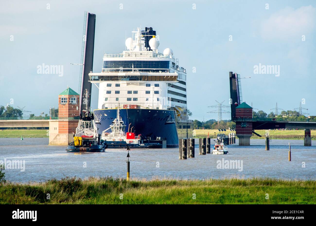 Leer, Germany. 30th Aug, 2020. The new cruise liner "Spirit of Adventure"  is sailing on the Ems and passes the Jann-Berghaus-Bridge. The ship built  for the British shipping company Saga Cruises is