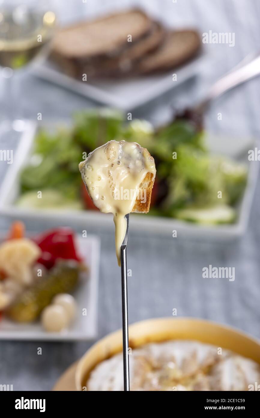Swiss cheese fondue with bread Stock Photo Alamy