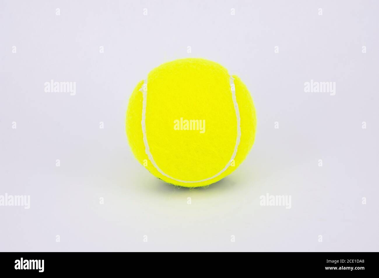 Still-life of new tennis ball, Surrey, England, United Kingdom Stock Photo