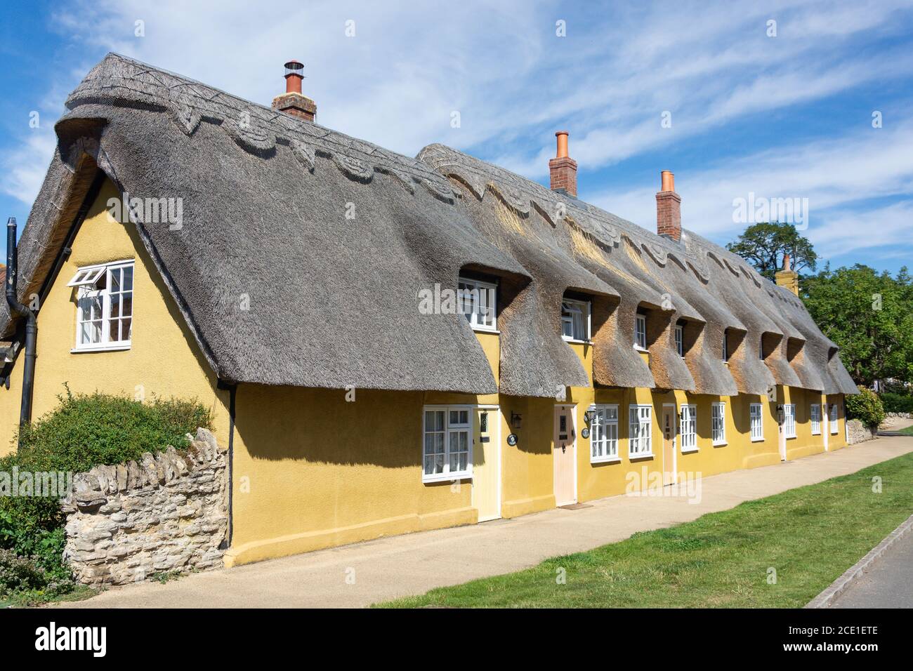 Thatched cottages, Main Road, Biddenham, Bedfordshire, England, United Kingdom Stock Photo