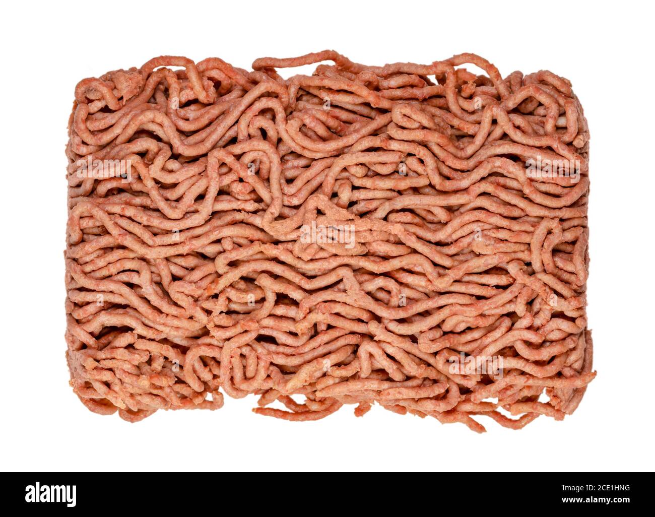 Vegan ground meat from above, isolated on white background. Substitute for minced meat based on pea protein, driven through the meat grinder. Stock Photo