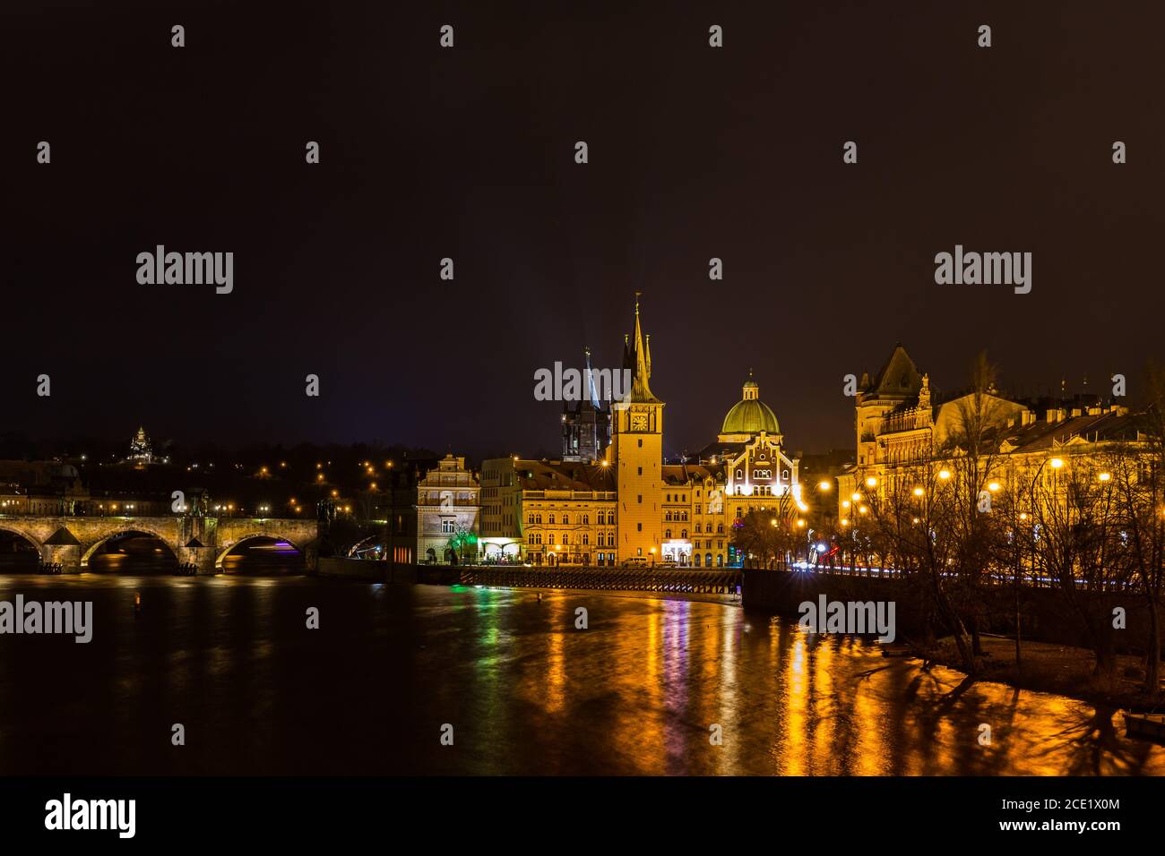 Beautiful night view of the light illuminated Charles Bridge over Vltava River and the Bedrich Smetana Museum in the center of old town of Prague, Cze Stock Photo