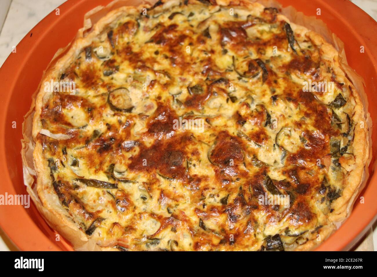 homemade tart pastry with spinach ,bacon, florentine quiche, cheese