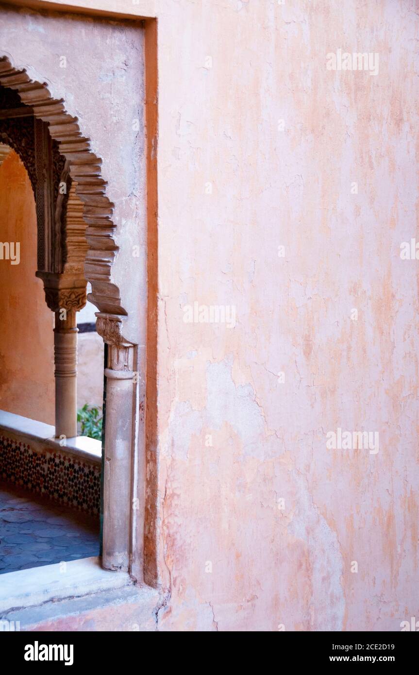 A Moorish architectural arch at Alhambra shows the details fof the arch