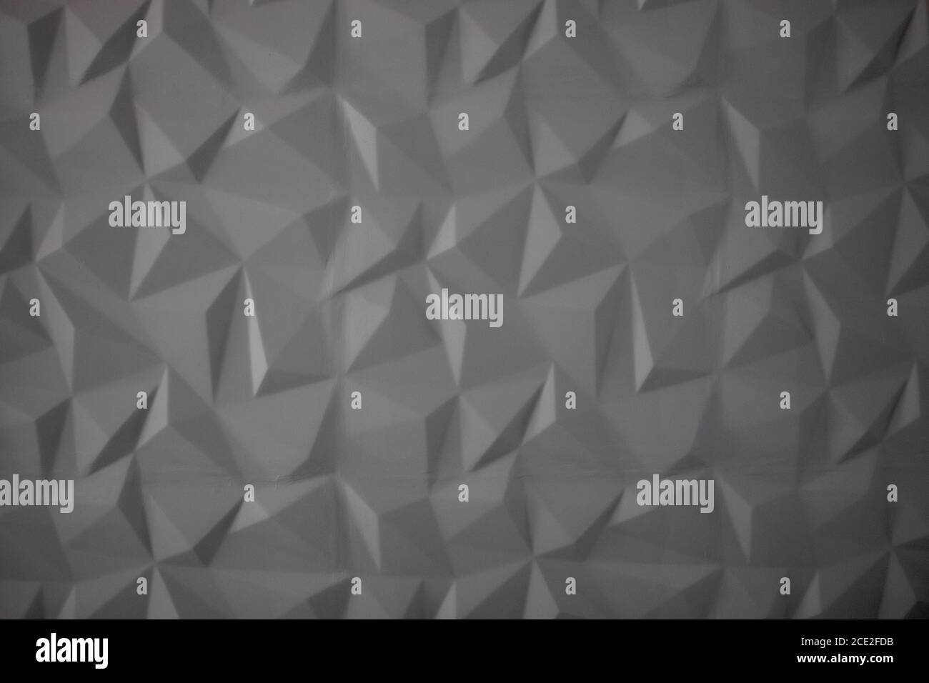 Abstract background of polygons on grey background. Stock Photo