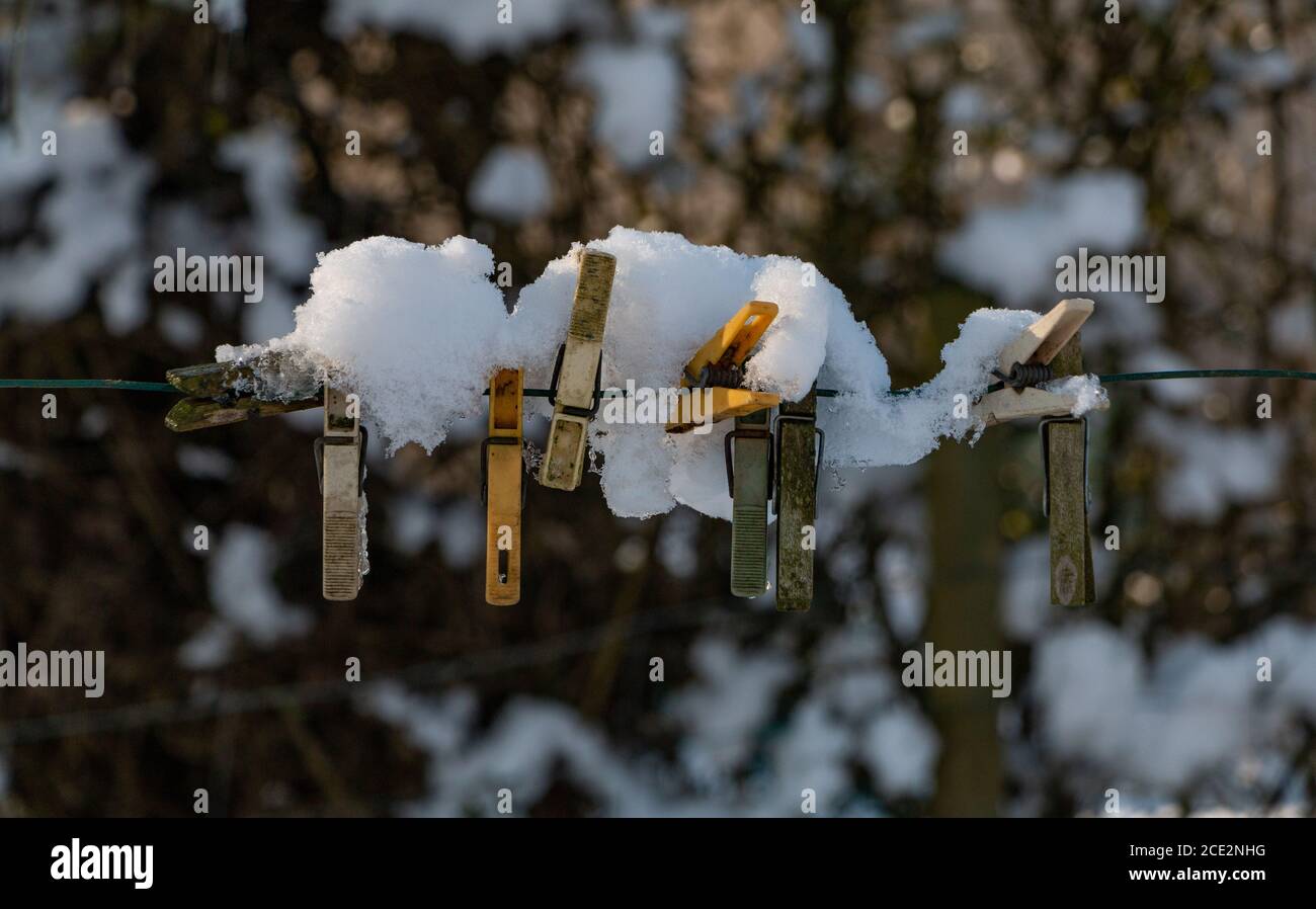 A picture of a group of snowy cloth clamps. Stock Photo