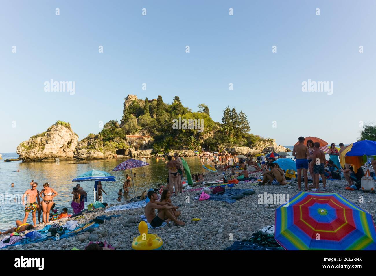 Crowded beach scene in isola hi-res stock photography and images - Alamy