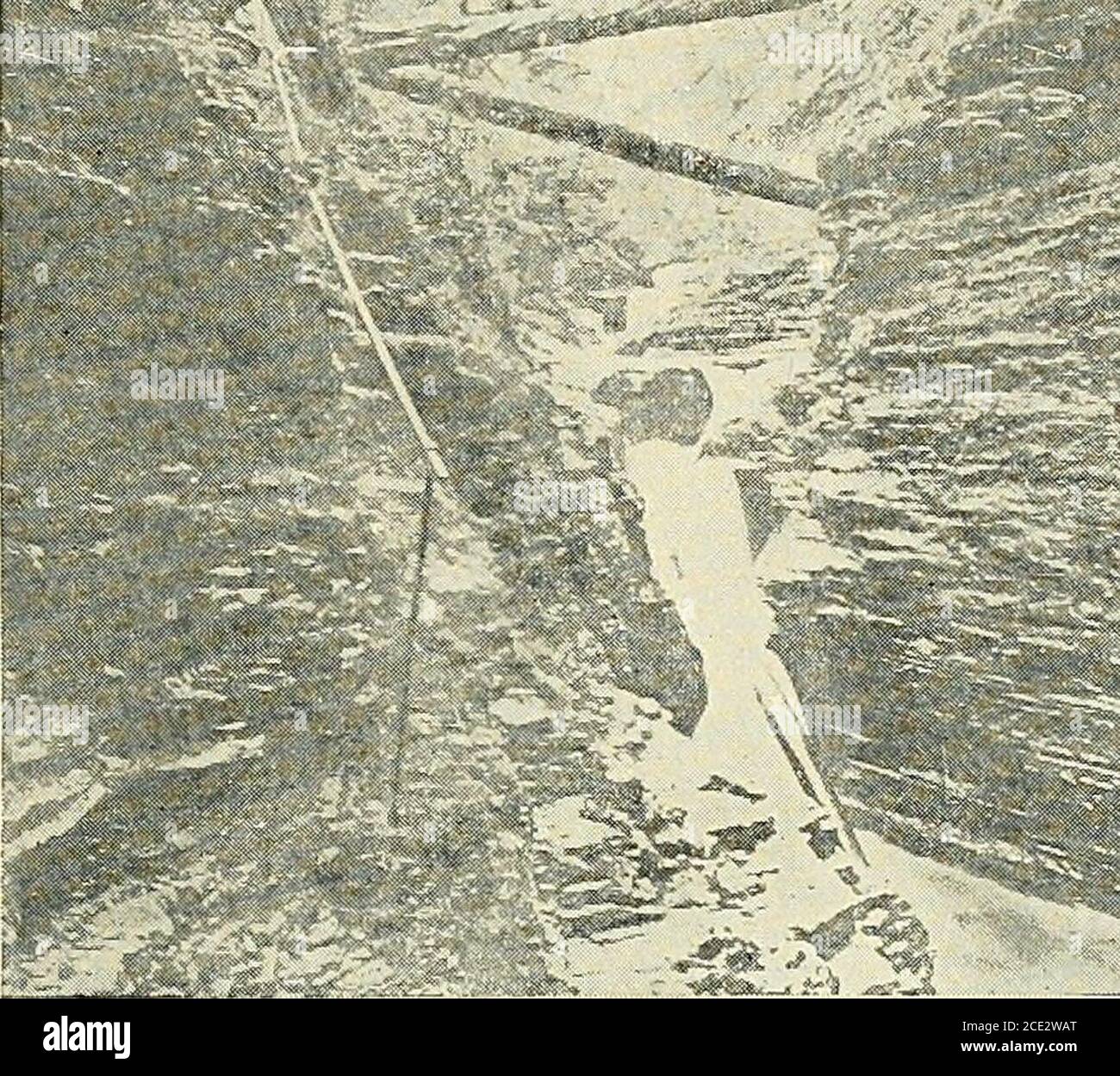 . Elementary physical geography . Fig. 132. Brink of Niagara Falls. A valley having very gently sloping sides above the falls and precipitous sides below. merely because they were valleys ready made. It wasbelieved that the crust of the earth had been contorted andfissured, that ocean floods had swept over the land, and thatthe rivers had practically no share in the formation of thevalleys which they occupied. We now know that the major-ity of rivers have formed their own valleys, that they haveformed them in a very slow way, and that most of them are RIVER VALLEYS. 265 still engaged inthe wor Stock Photo
