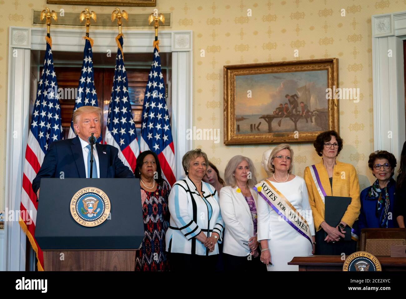 U.S. President Donald Trump delivers remarks during an event marking the 100th Anniversary of the Ratification of the 19th Amendment in the Blue Room of the White House August 18, 2020 in Washington, DC. Stock Photo