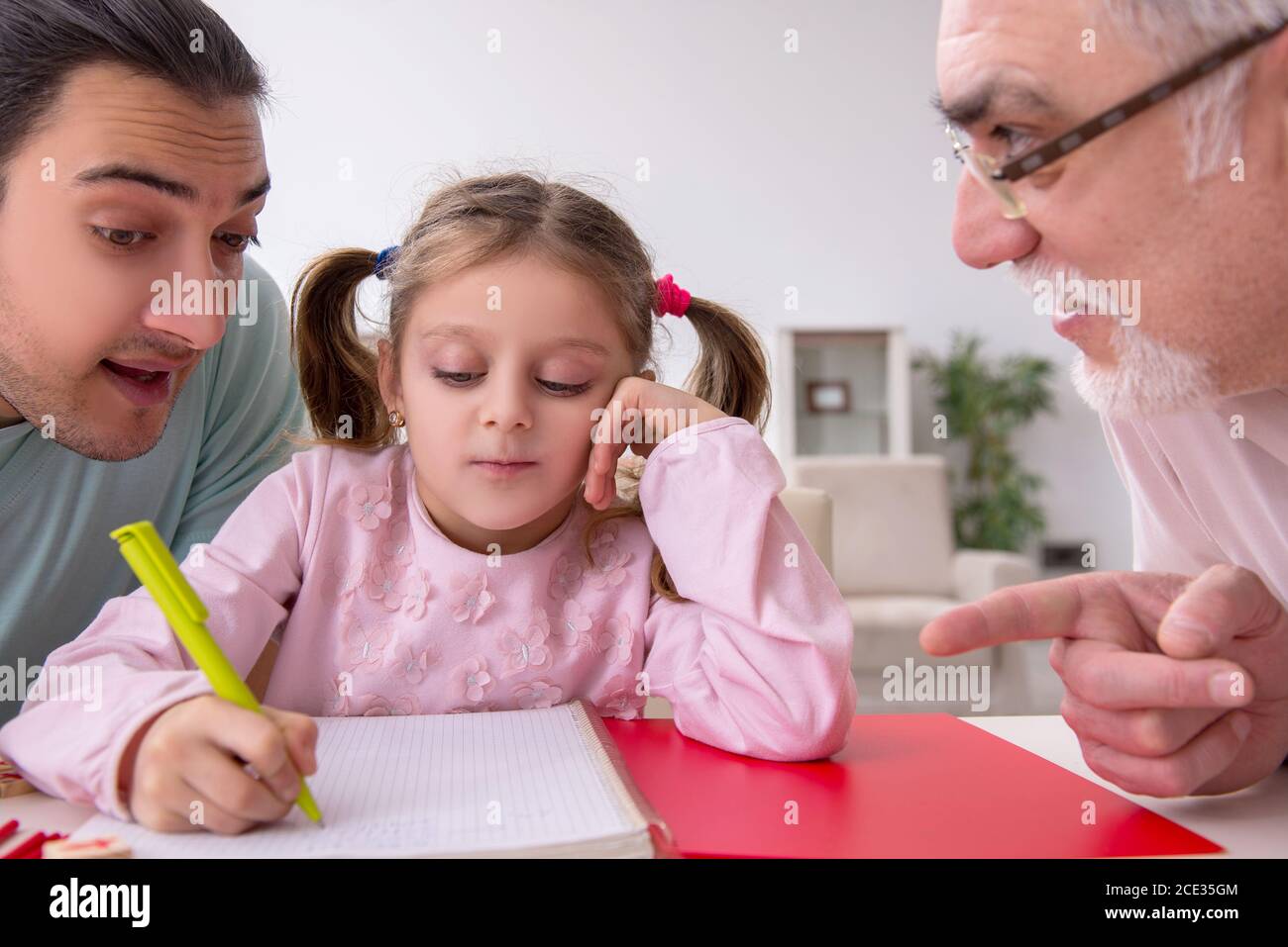 Three generations of family in the early development concept Stock