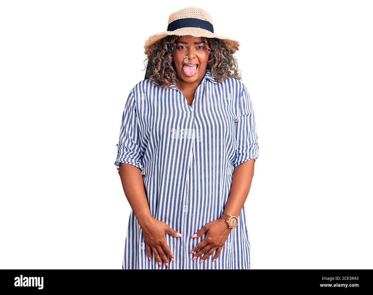 Young african american plus size woman wearing summer hat sticking ...