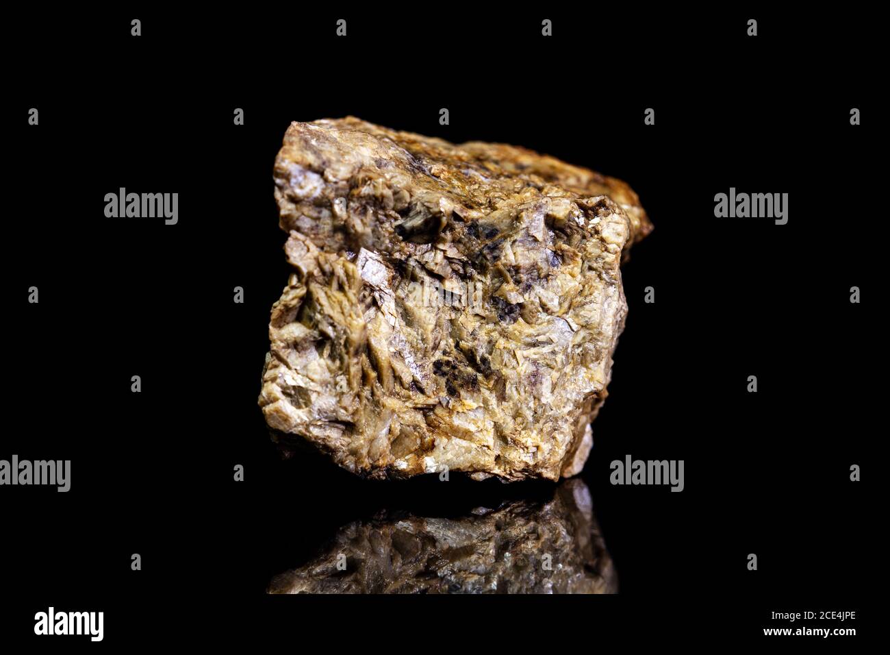 Chalybite, siderite or iron spar ore, raw rock on black background, mining and geology, mineralogy Stock Photo