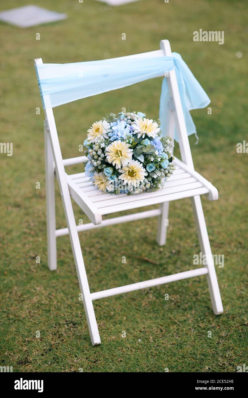 Bride sitting on chair hi-res stock photography and images - Alamy