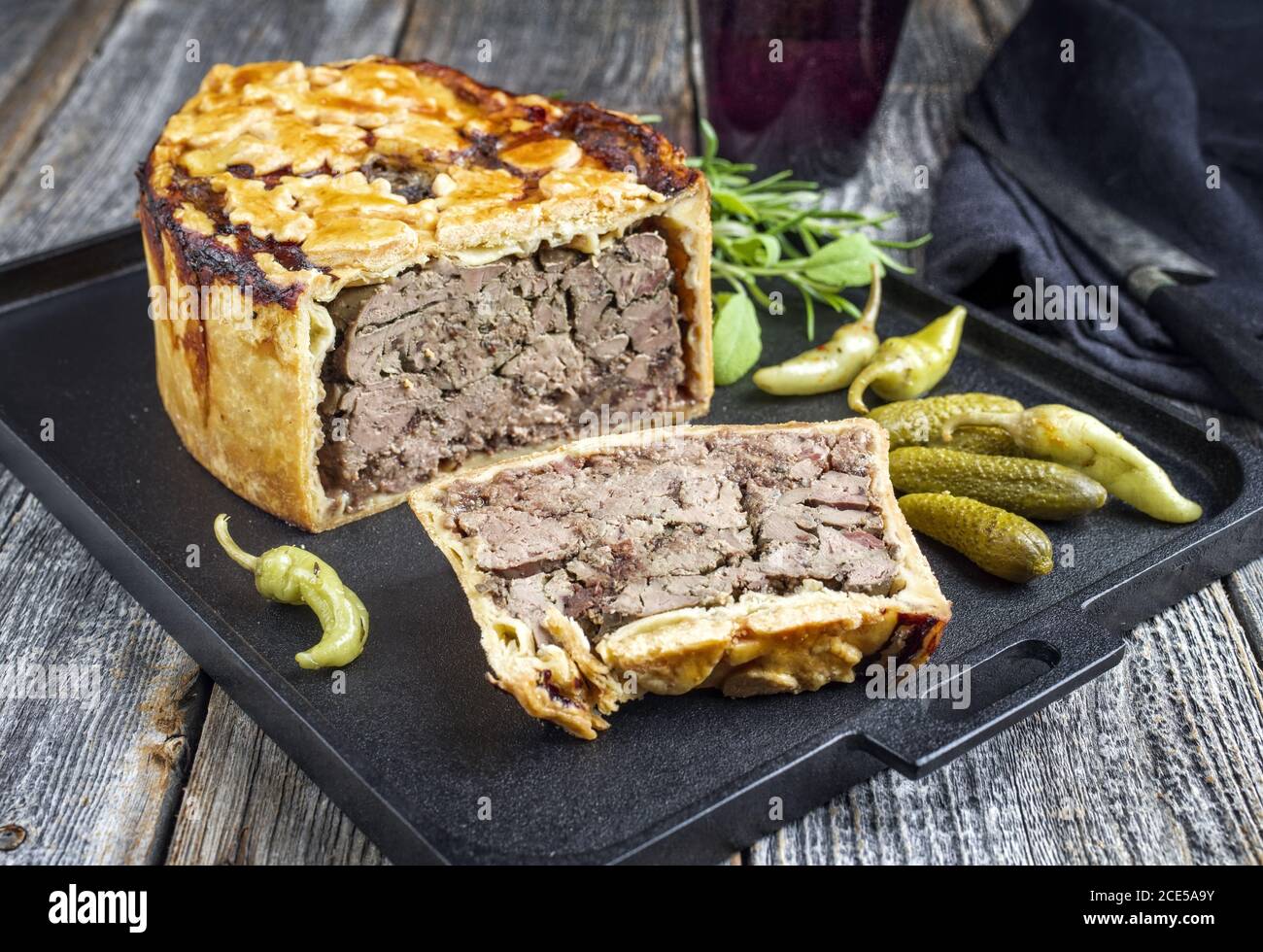Traditional French pate en croute with goose liver as closeup with