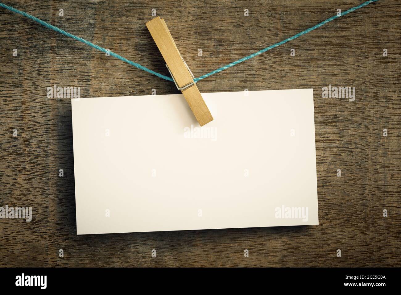 card on wire with clothes peg Stock Photo