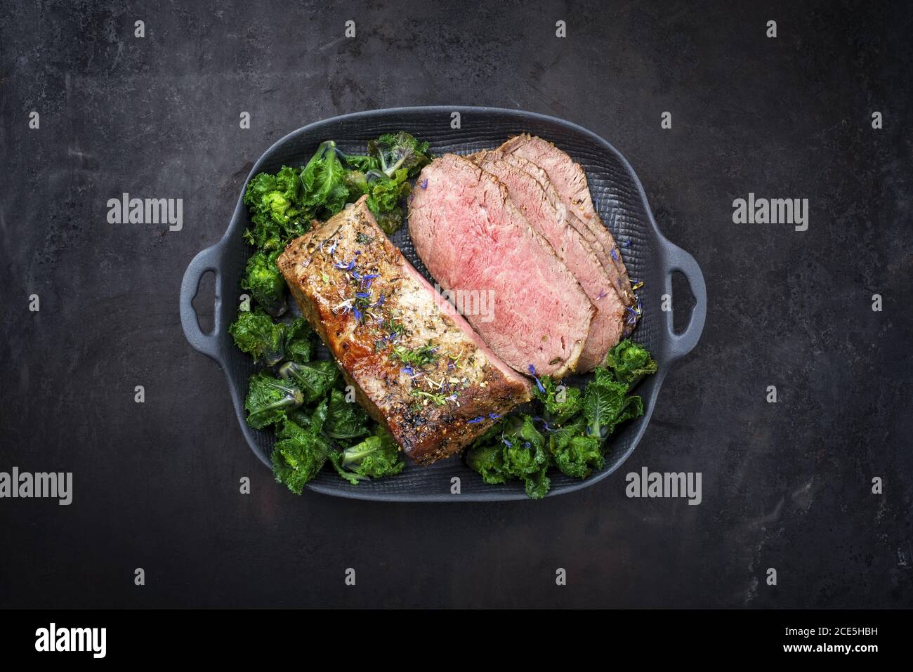 Traditional Commonwealth Sunday roast with sliced cold cuts roast beef
