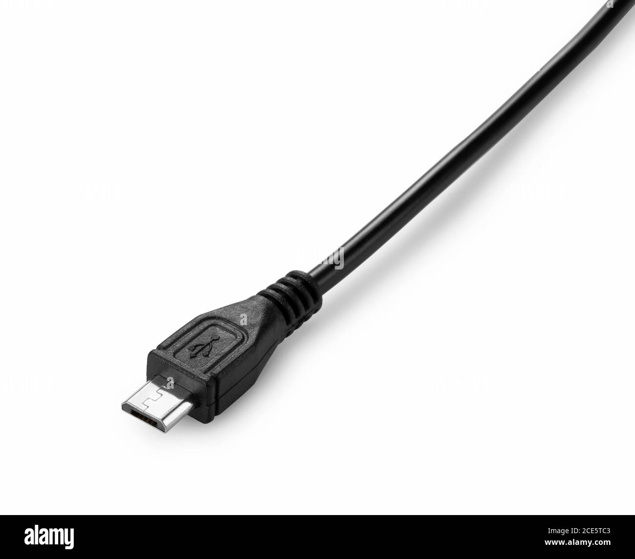 Shooting a micro USB placed on a blue background from an angle Stock Photo