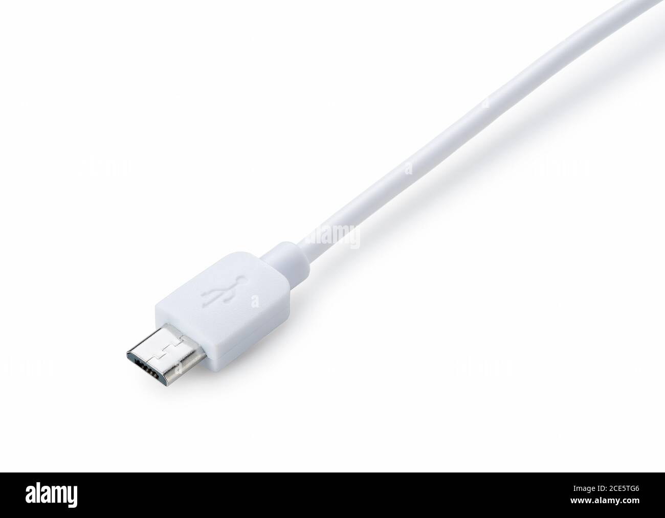 Shooting a micro USB placed on a blue background from an angle Stock Photo