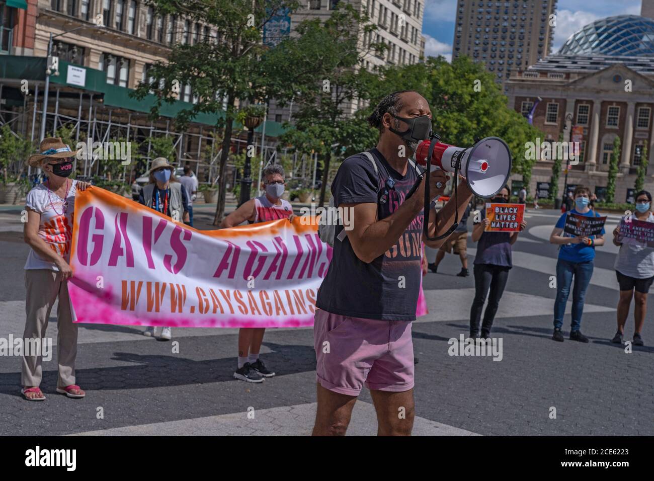 NEW YORK, NEW YORK - AUGUST 30: Activist speaks during a Gay Against Guns protest on August 30, 2020 in New York City. Stock Photo