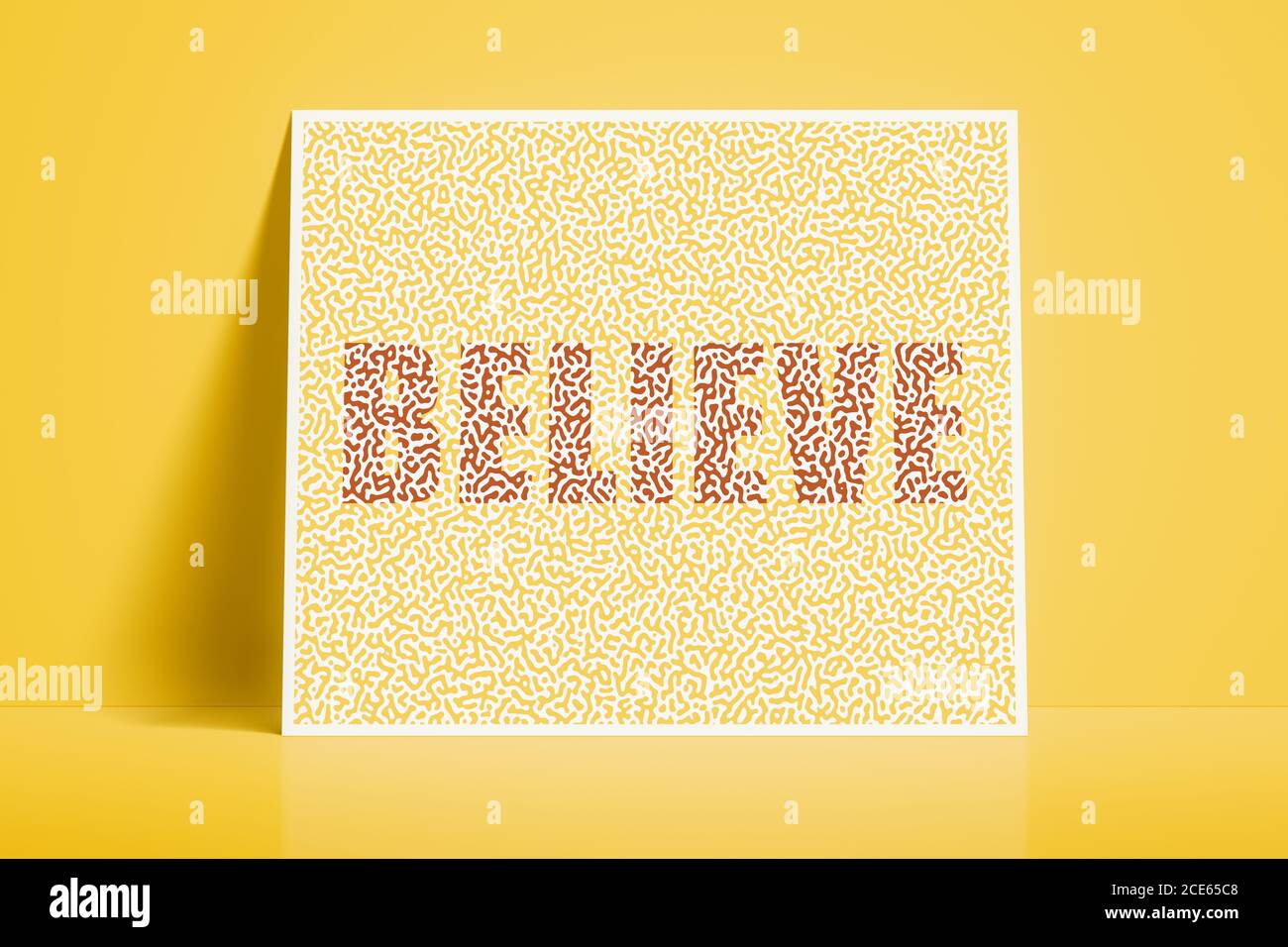 textured card with the word believe Stock Photo