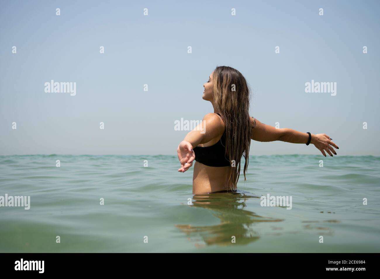 Happy woman in the sea Stock Photo