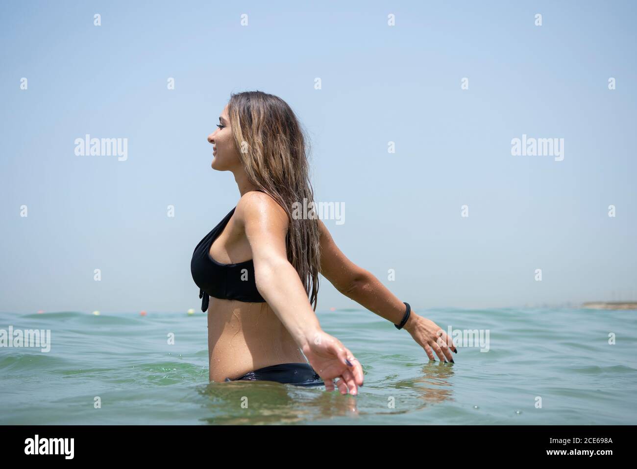 Happy woman in the sea Stock Photo