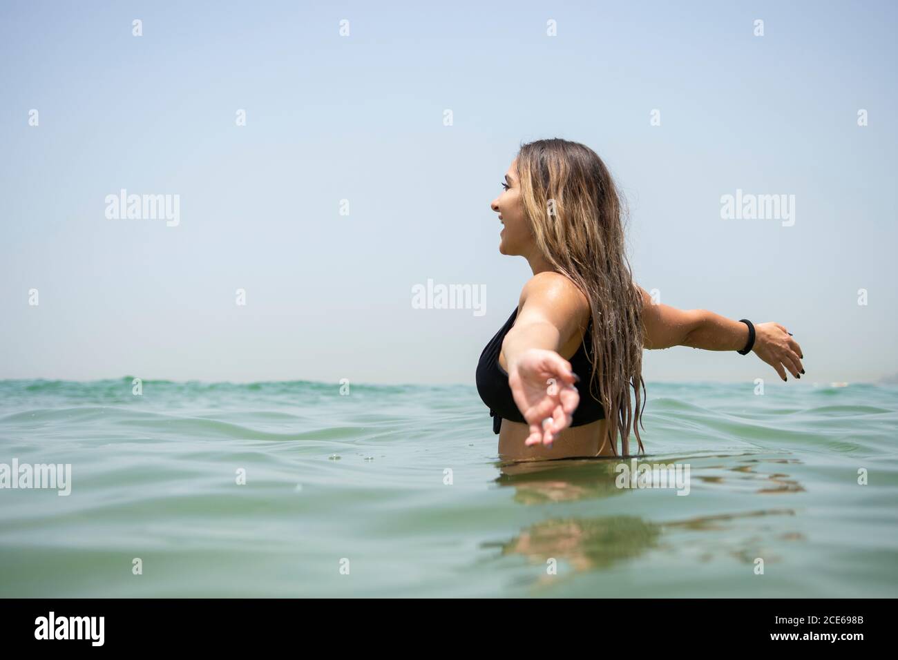 Happy woman in the sea Stock Photo