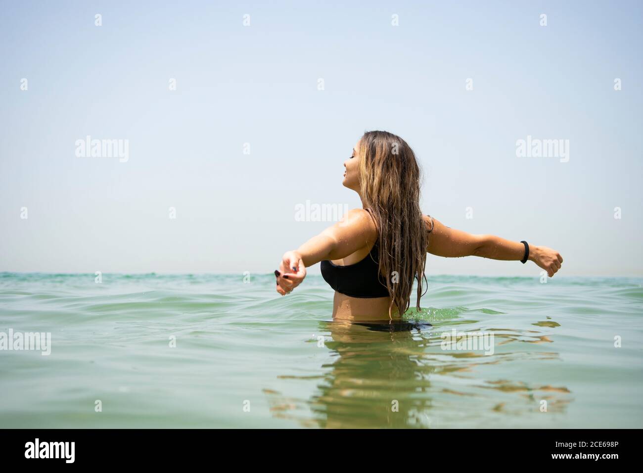 Happy woman in the sea Stock Photo