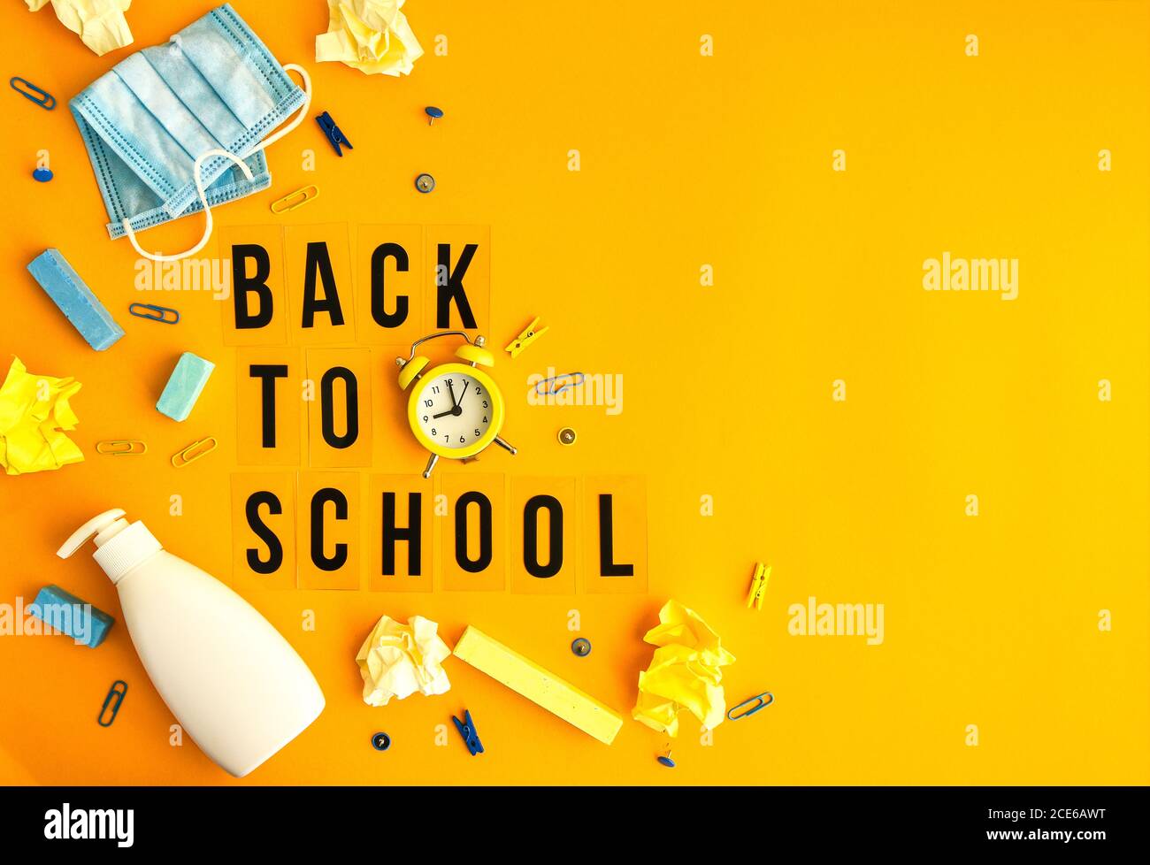 Text Back To School On Yellow Background With School Supplies Protective Face Mask And Sanitizer Antiseptic New Normal School Quarantine Concept Stock Photo Alamy