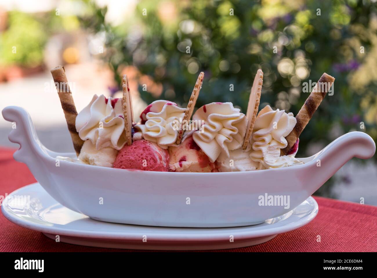 delicate sundae - fruit ice cream with cream and ice cream cones Stock Photo