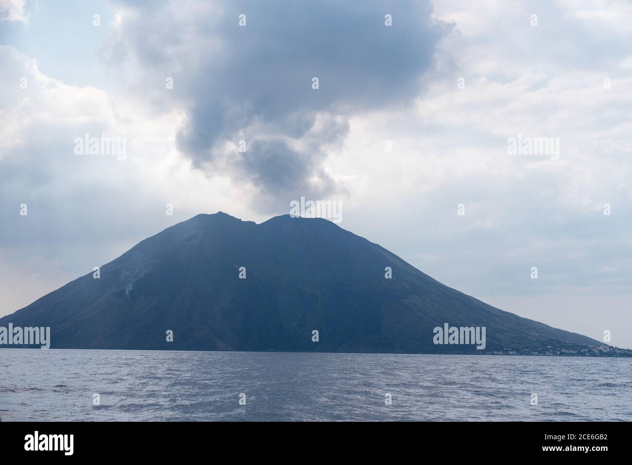 Cloud of smoke over the active Stromboli volcano in Italy Stock Photo