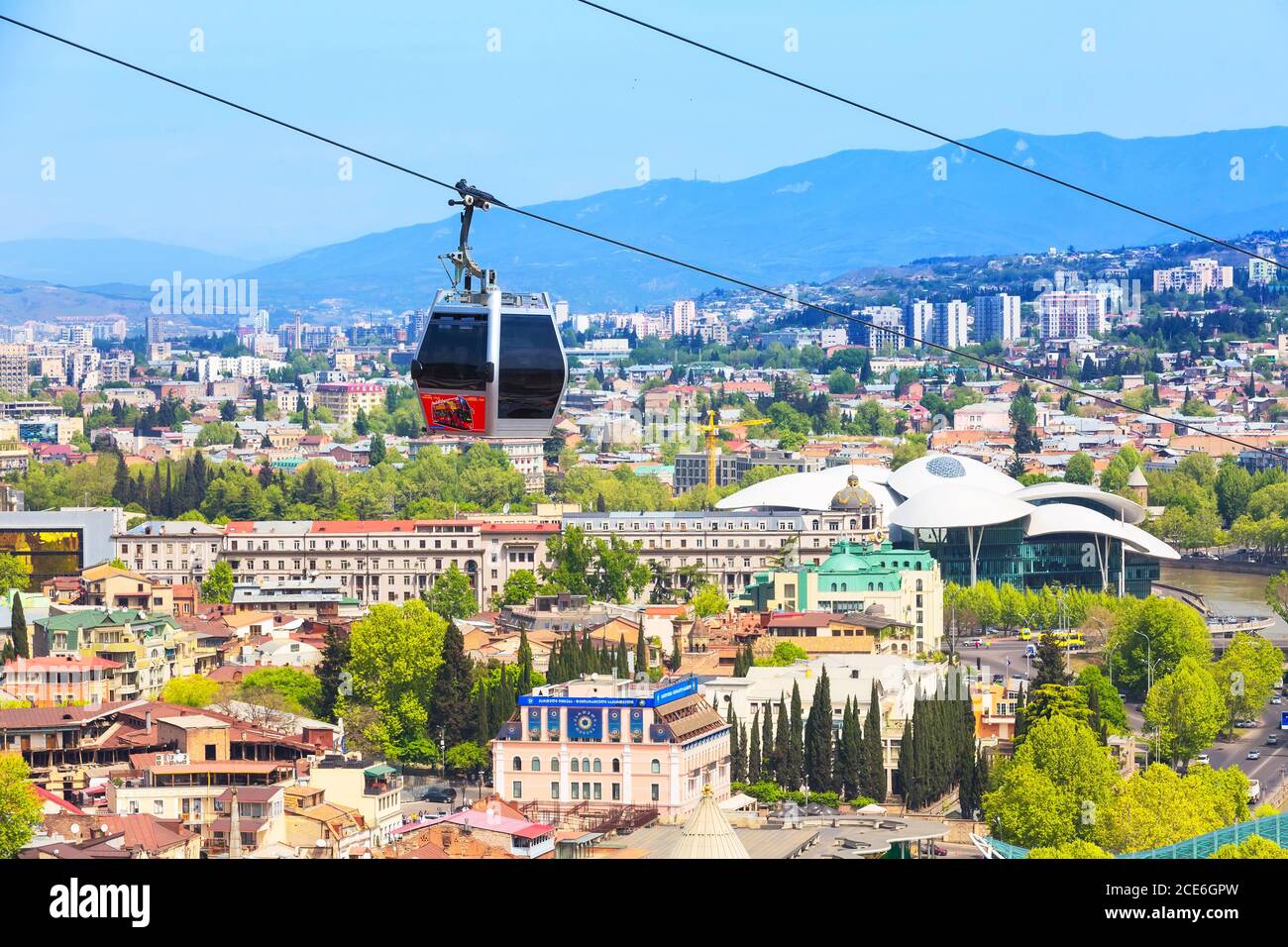 Tbilisi, cable car cabins and aerial city skyline Stock Photo