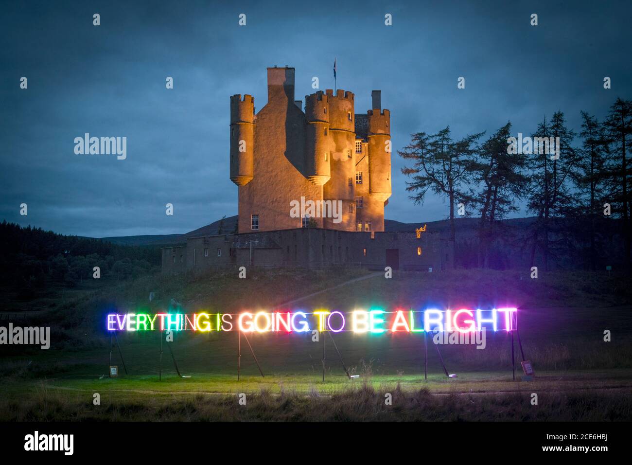 A multi-coloured neon sign that reads 'Everything Is Going To Be Alright' by Turner Prize winning artist Martin Creed has been unveiled in the grounds of Braemar Castle, Aberdeenshire. Stock Photo