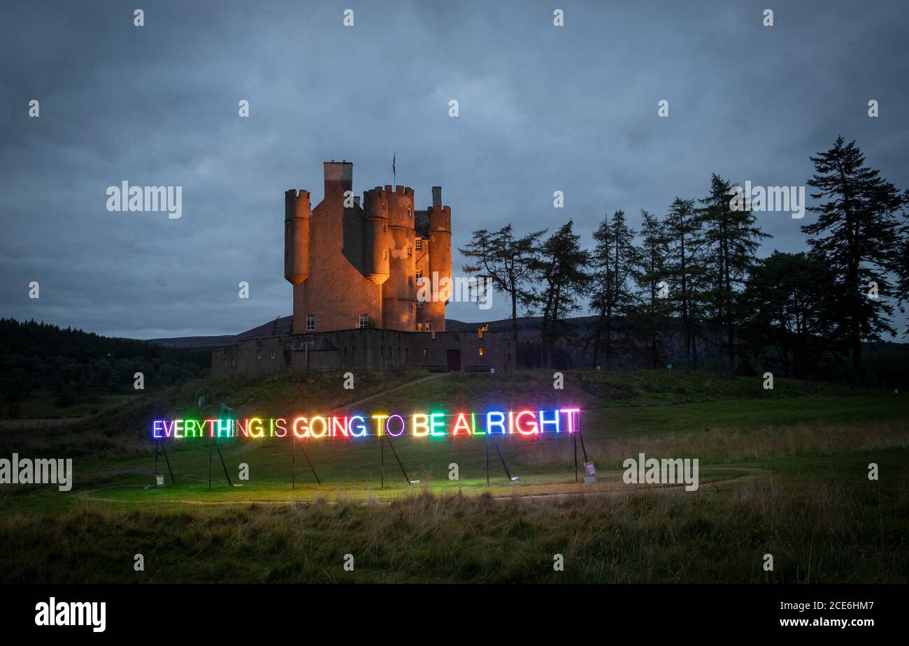A multi-coloured neon sign that reads 'Everything Is Going To Be Alright' by Turner Prize winning artist Martin Creed has been unveiled in the grounds of Braemar Castle, Aberdeenshire. Stock Photo