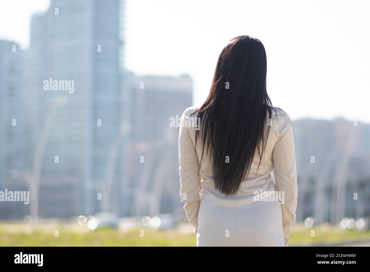 Woman street long dress rear hi-res stock photography and images - Alamy
