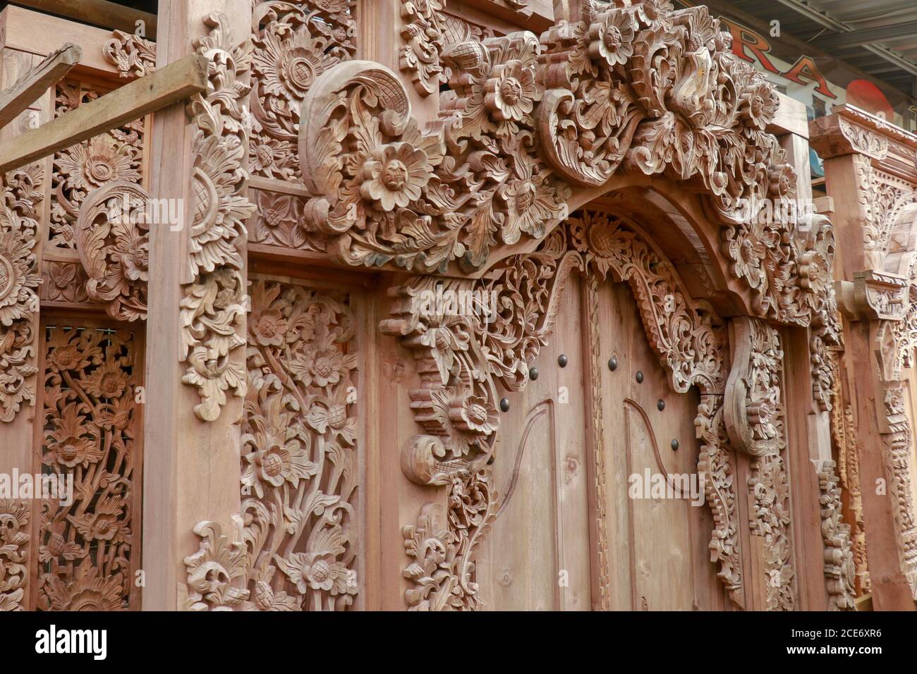 close-up image of ancient door.Carved doors and door frames. Traditional  art of Balinese carvers. Finished products ready for sale Stock Photo -  Alamy