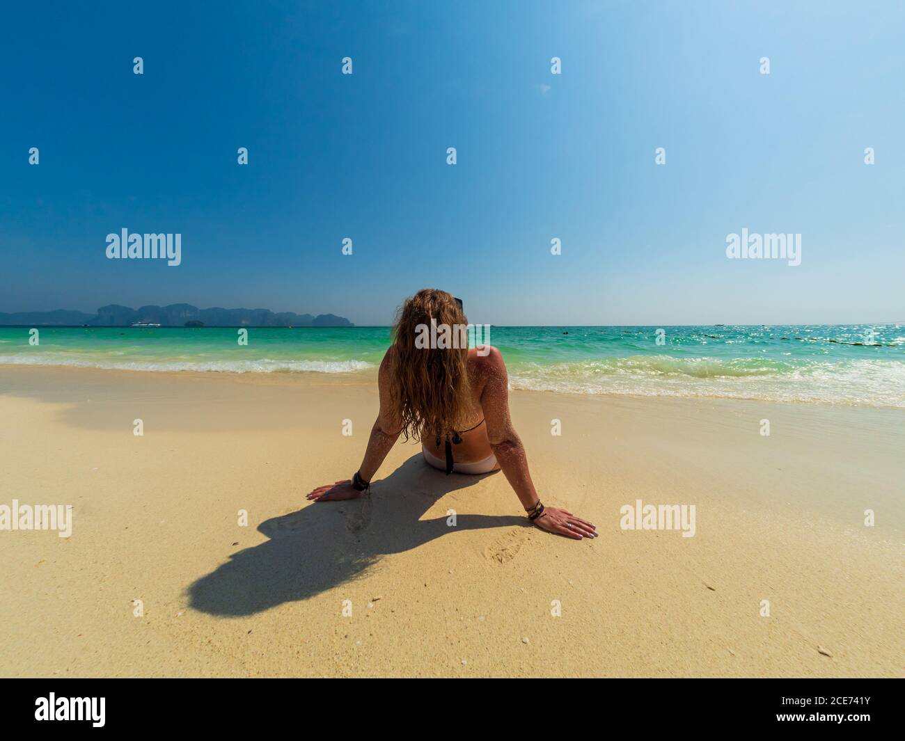 Woman on the Thai beach of Poda island in Krabi Thailand Stock Photo