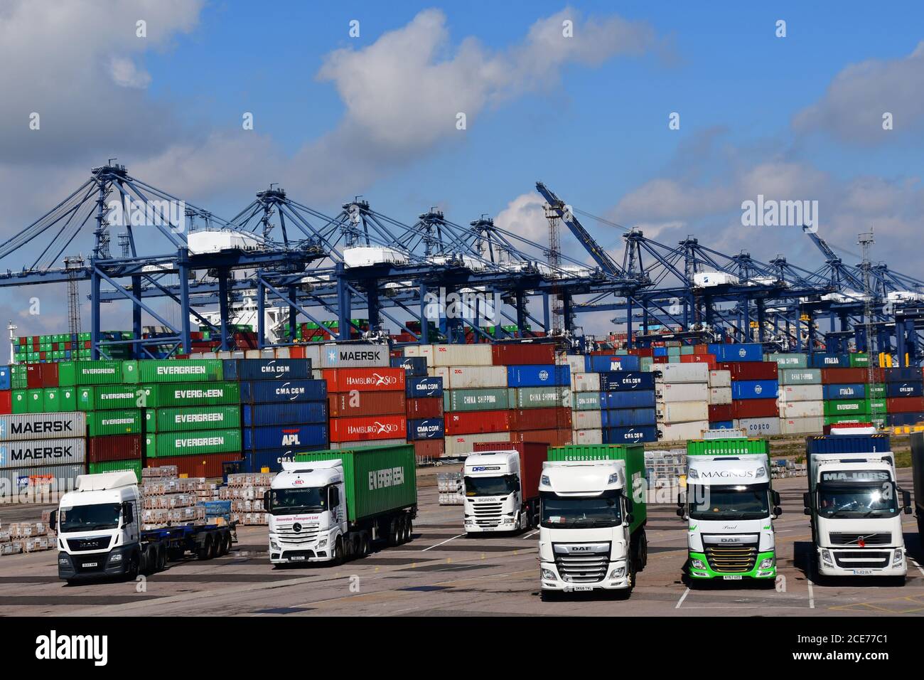 Containers on lorries at Felixstowe Port, Suffolk, UK Stock Photo
