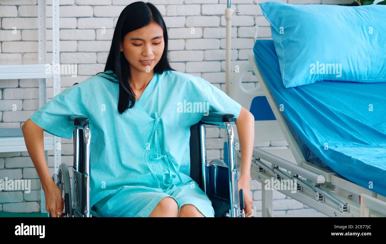 Asian girl sitting on hospital hi-res stock photography and images - Alamy