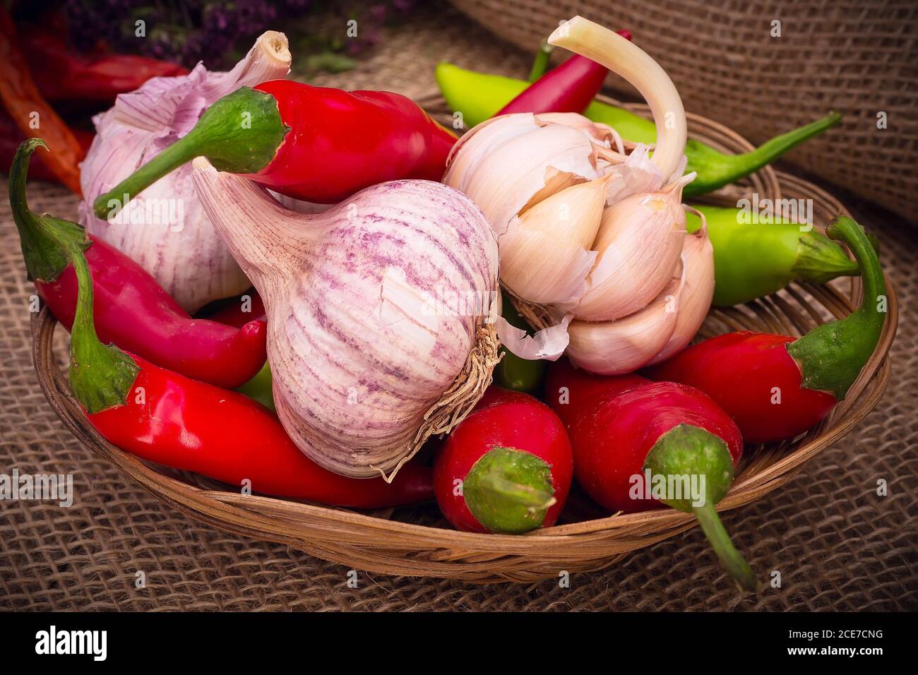 garlic, green and red hot chili peppers Stock Photo Alamy