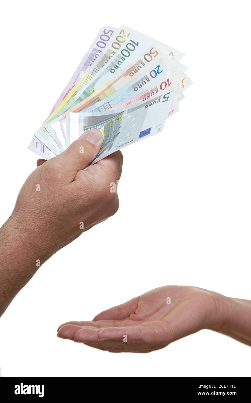Hand requests euro banknotes from another person Stock Photo
