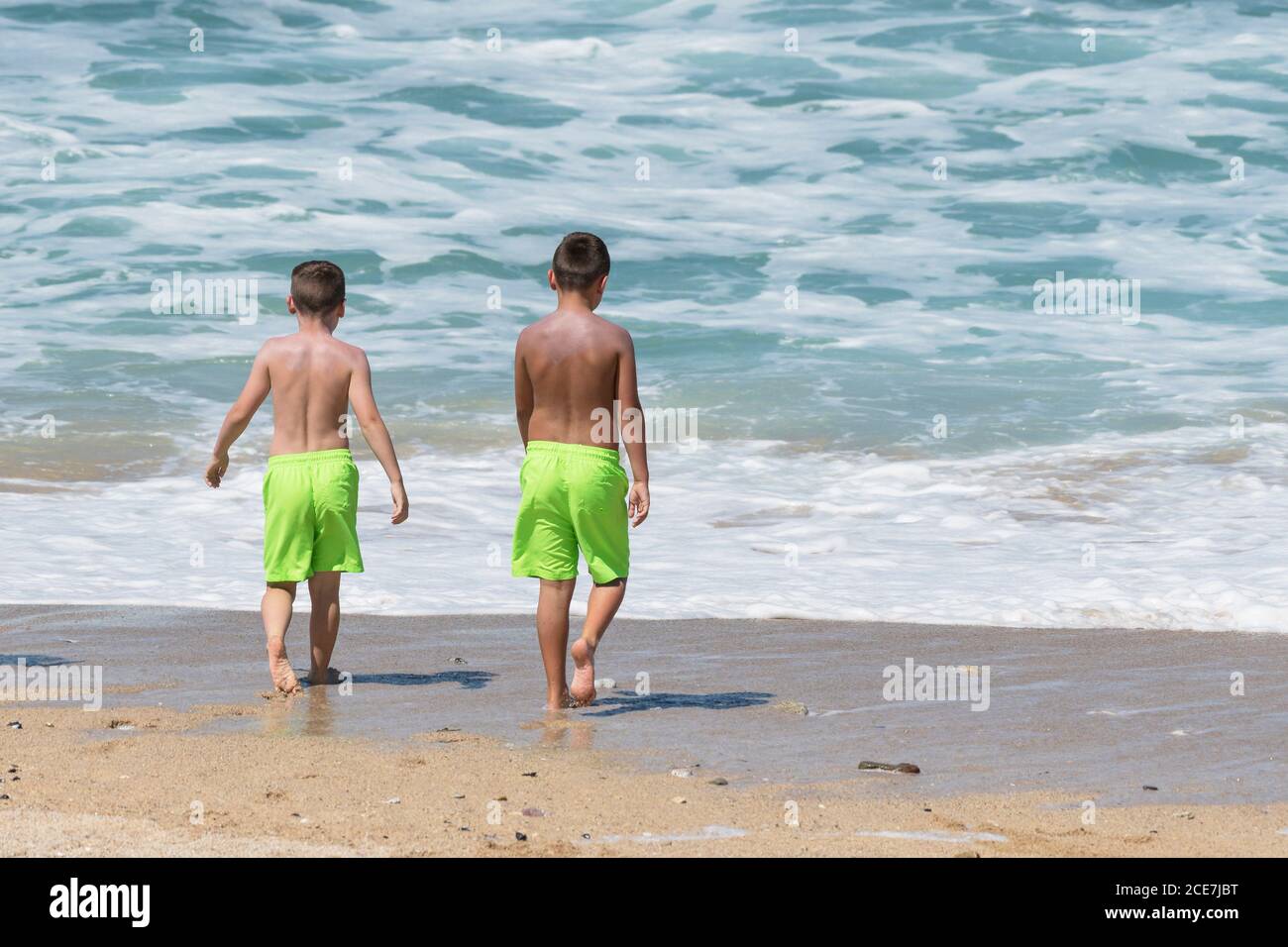 Boys in shorts hi-res stock photography and images - Alamy