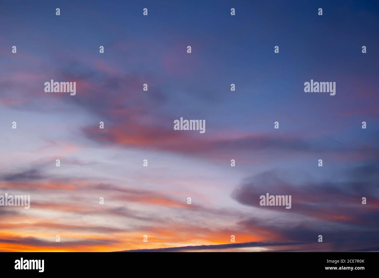 Colorful sky with clouds at sunset, nature background Stock Photo - Alamy