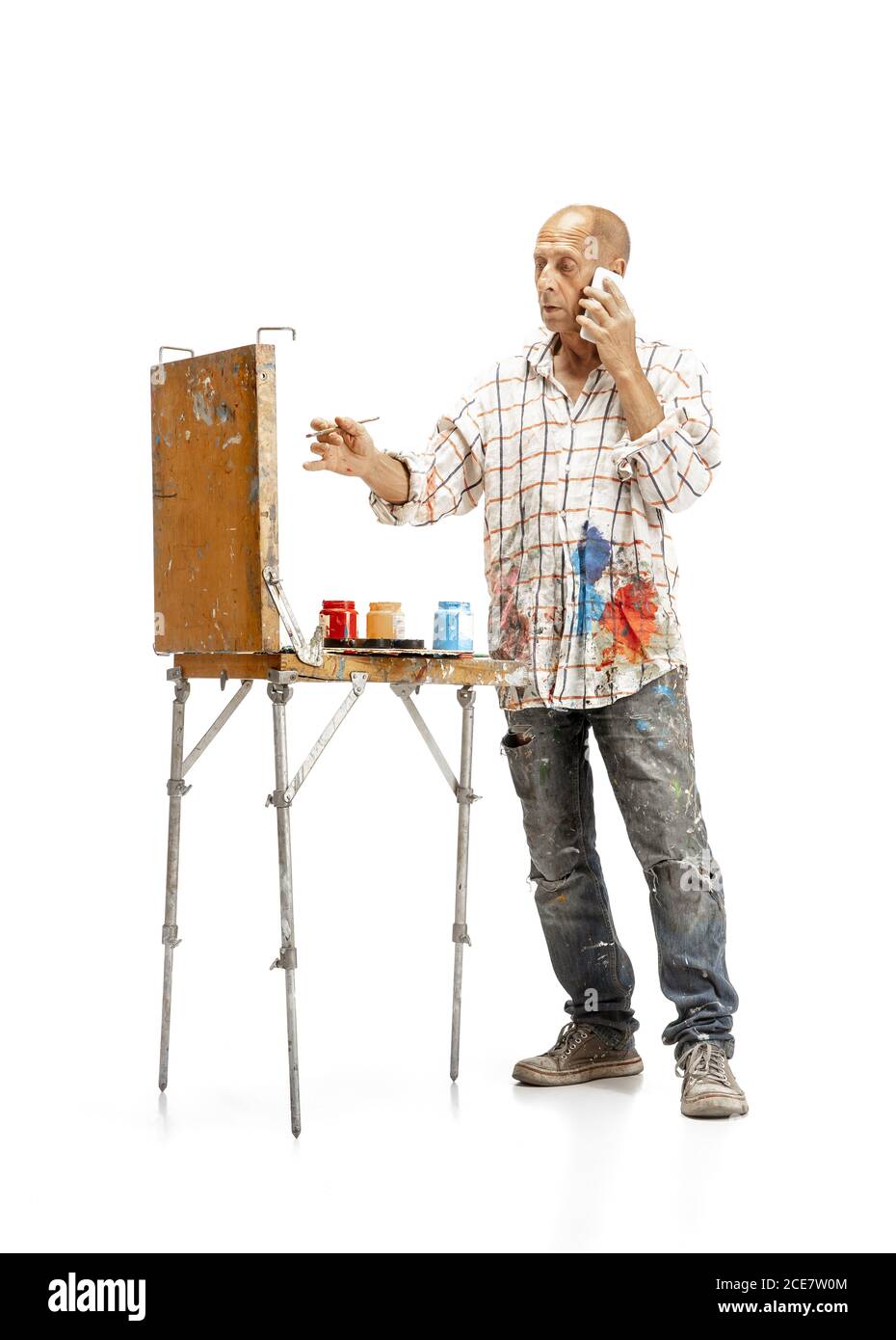 Talking Phone Male Caucasian Artist Painter At Work On White Studio Background Painting Working With Colors Making Composition Concept Of Professional Occupation Work Job Craft Production Stock Photo Alamy